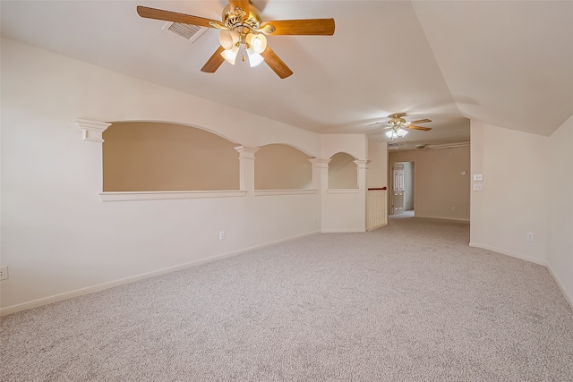 bonus room with carpet flooring, ceiling fan, vaulted ceiling, and decorative columns