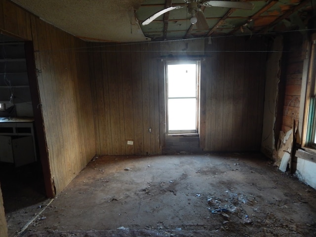 spare room featuring ceiling fan