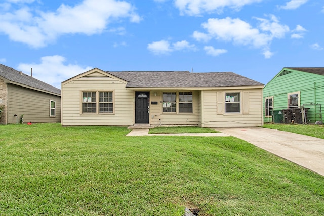 ranch-style home with a front yard