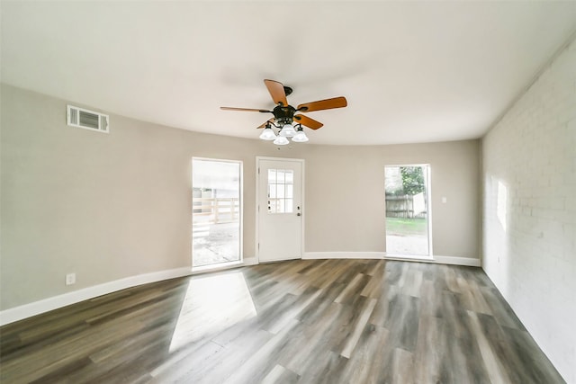 empty room featuring ceiling fan and wood-type flooring