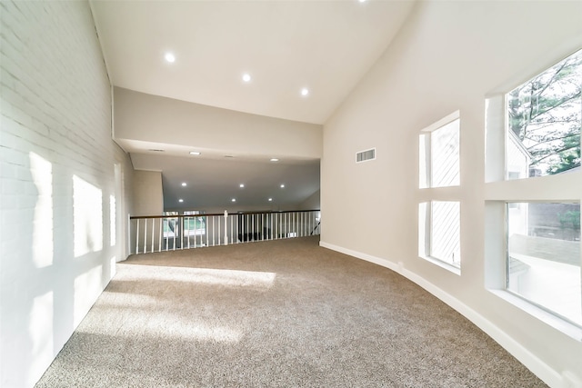 interior space with a towering ceiling