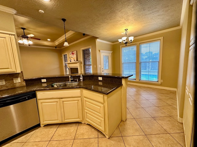 kitchen featuring ceiling fan with notable chandelier, a textured ceiling, light tile patterned floors, decorative light fixtures, and dishwasher