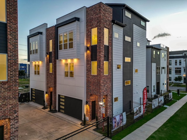 view of property exterior at dusk