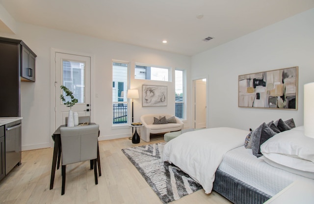 bedroom with light hardwood / wood-style flooring