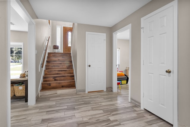 stairway with wood-type flooring