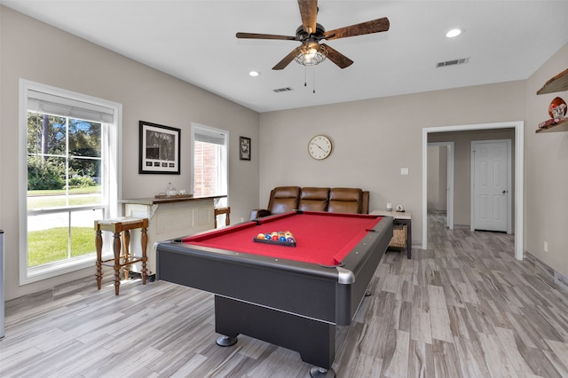 recreation room featuring light hardwood / wood-style flooring, ceiling fan, and billiards