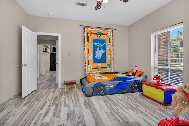 bedroom featuring light wood-type flooring