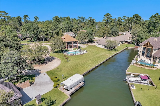 birds eye view of property featuring a water view