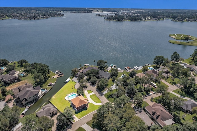 bird's eye view with a water view