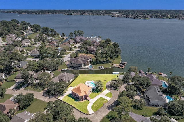 bird's eye view with a residential view and a water view