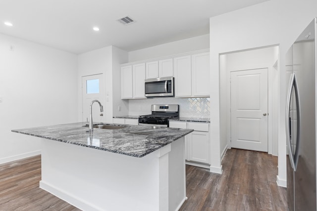 kitchen featuring sink, white cabinetry, stainless steel appliances, and dark hardwood / wood-style flooring