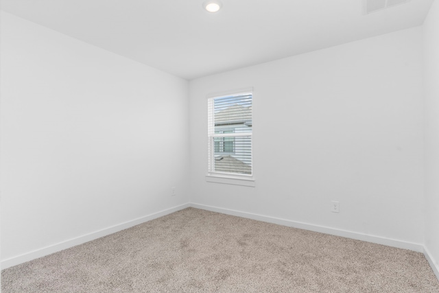 view of carpeted spare room