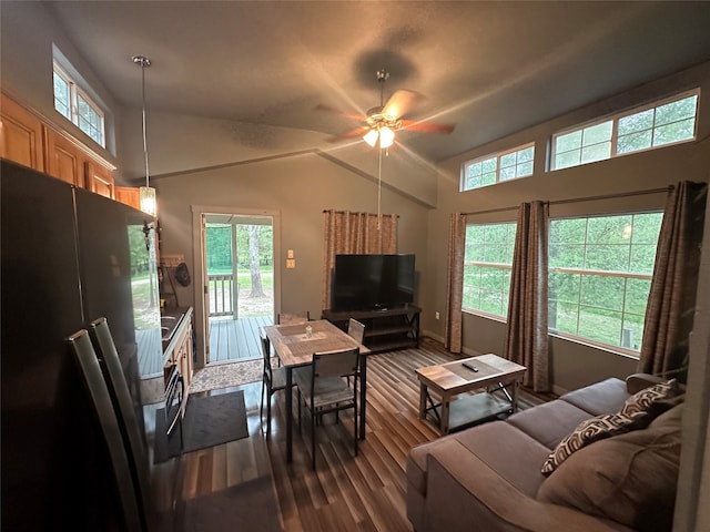 living room with lofted ceiling, ceiling fan, and dark hardwood / wood-style floors