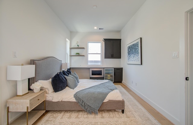 bedroom with wood-type flooring