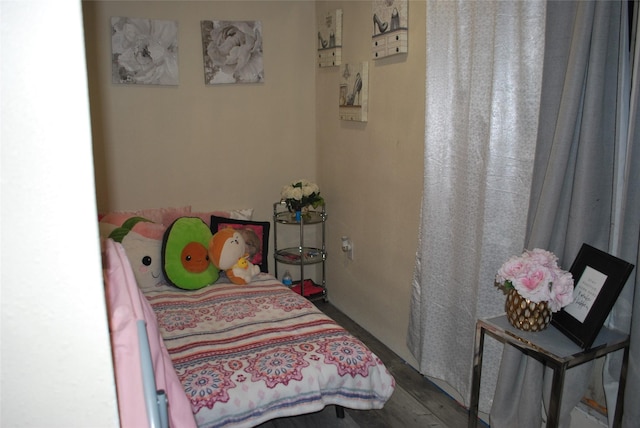 bedroom with wood-type flooring