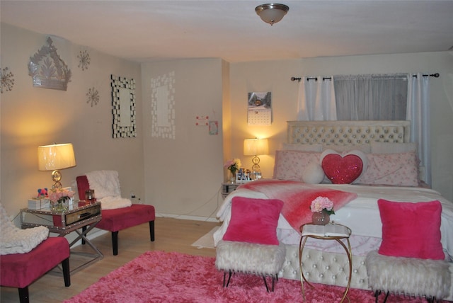 bedroom featuring light wood-type flooring