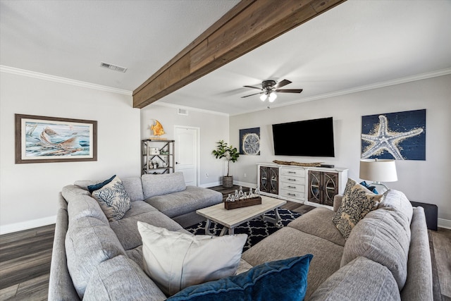 living room with ornamental molding, beam ceiling, dark wood-type flooring, and ceiling fan