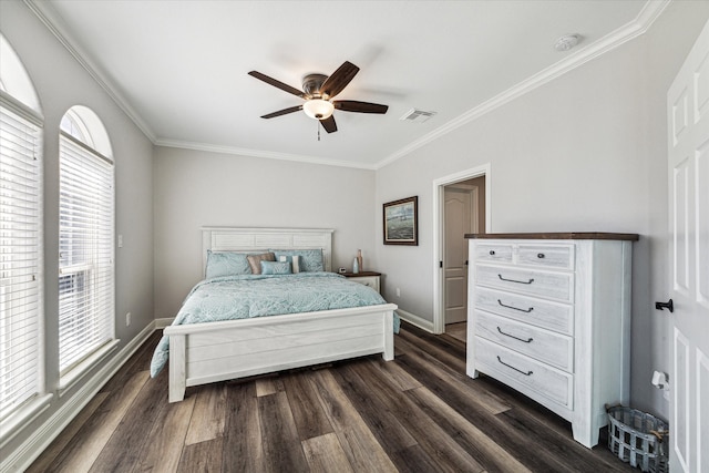 bedroom featuring multiple windows, crown molding, ceiling fan, and dark wood-type flooring