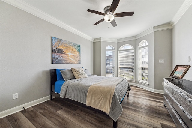 bedroom featuring ceiling fan, dark hardwood / wood-style floors, and ornamental molding