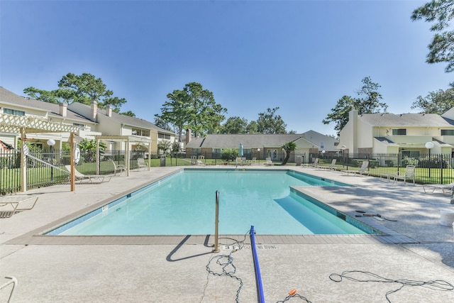 view of swimming pool with a pergola and a patio area