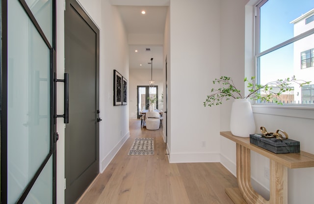 hall featuring light hardwood / wood-style floors