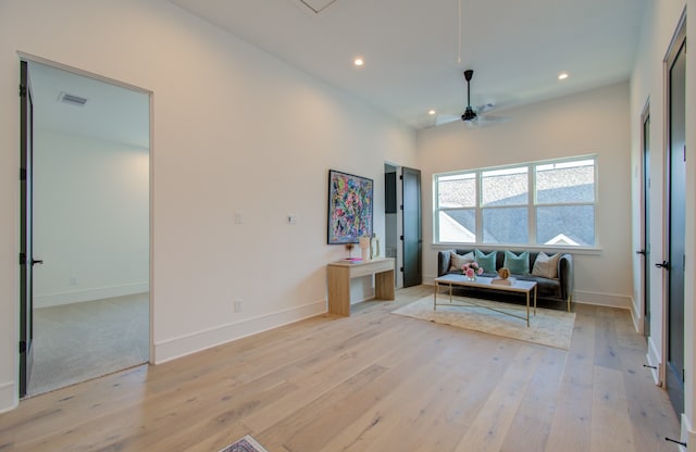 interior space with ceiling fan and light wood-type flooring