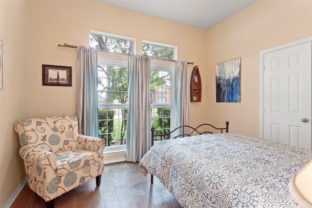 bedroom featuring dark wood-type flooring