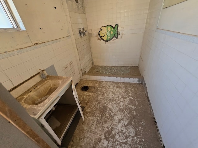 bathroom featuring vanity and walk in shower