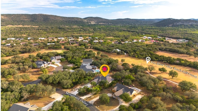 drone / aerial view featuring a mountain view