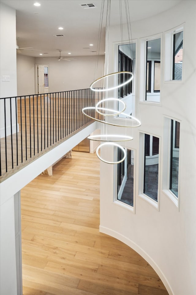 corridor with wood-type flooring