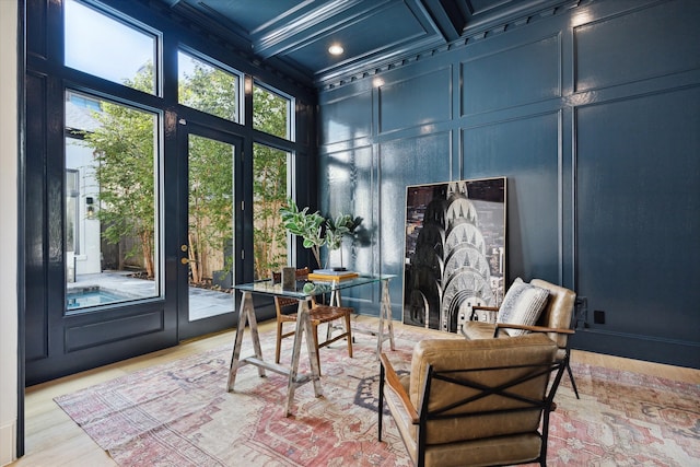 sunroom with beamed ceiling and coffered ceiling