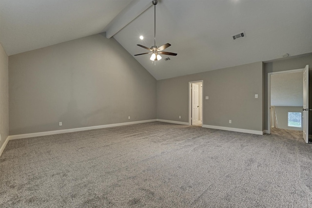 empty room featuring carpet, ceiling fan, beam ceiling, and high vaulted ceiling