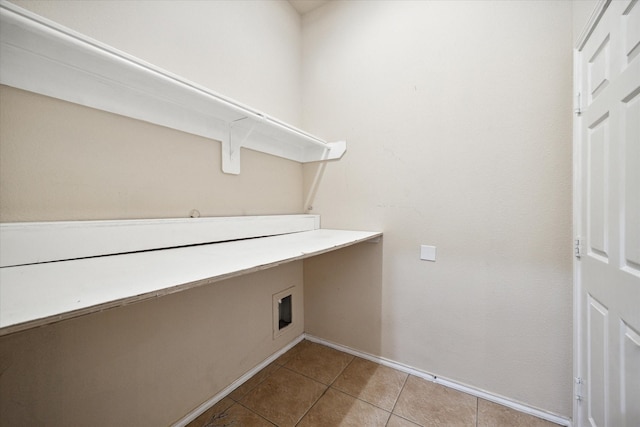 laundry room featuring light tile patterned flooring