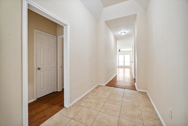 hall with light hardwood / wood-style floors