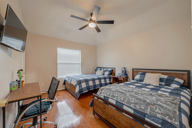 bedroom featuring hardwood / wood-style floors and ceiling fan