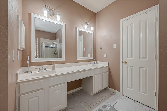 bathroom featuring vanity and an enclosed shower