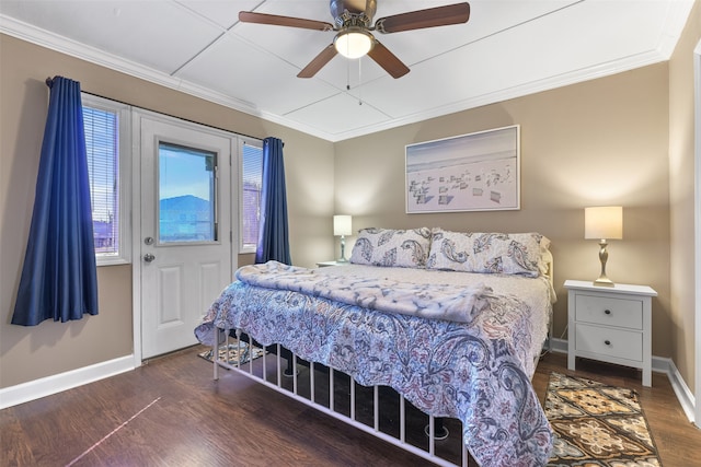 bedroom with crown molding, ceiling fan, and dark hardwood / wood-style flooring