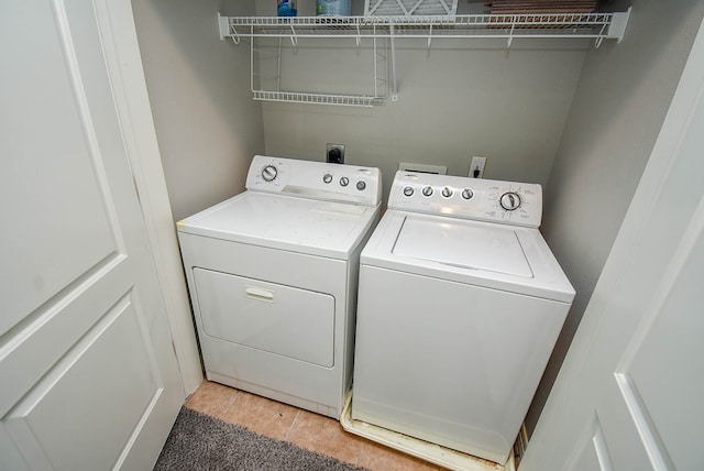 laundry room featuring independent washer and dryer