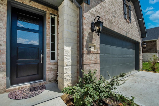 property entrance featuring a garage