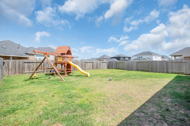 view of yard with a playground