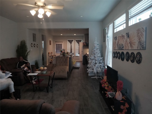 living room featuring ceiling fan