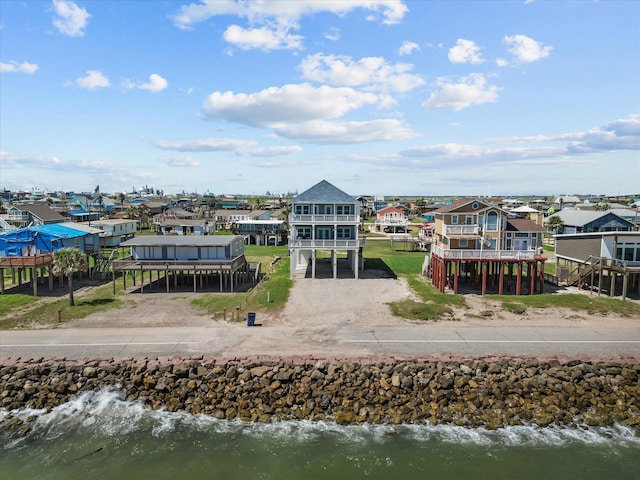 aerial view featuring a water view and a residential view