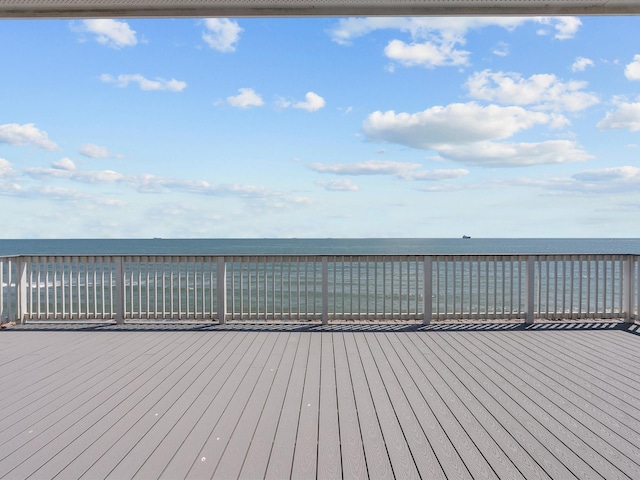 wooden terrace with a water view