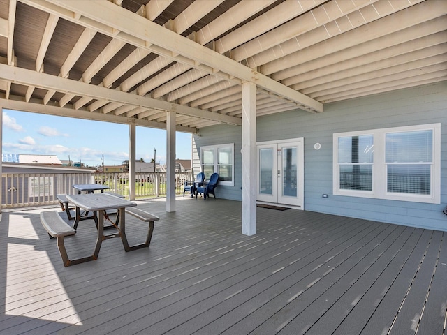 wooden deck featuring french doors