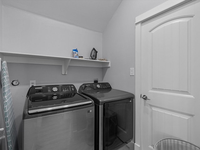 laundry area with washing machine and dryer and laundry area
