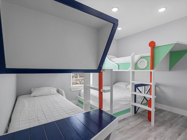 bedroom featuring wood-type flooring