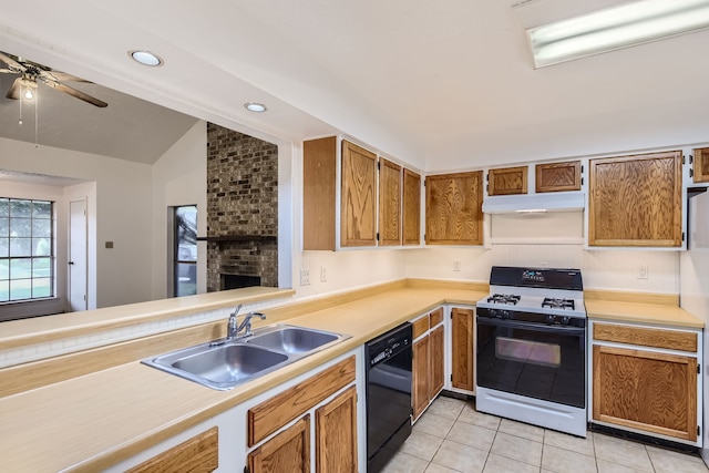 kitchen with sink, lofted ceiling, black dishwasher, white range with gas cooktop, and ceiling fan