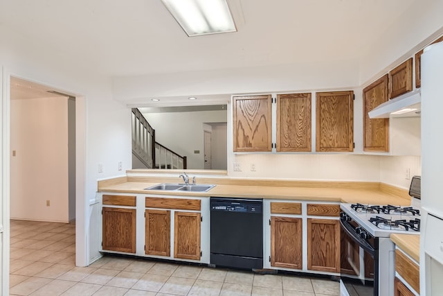 kitchen with dishwasher, white gas stove, sink, and light tile patterned floors