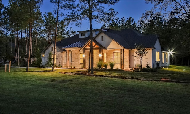 view of front of home with a front yard