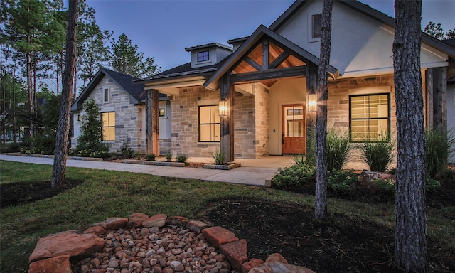 view of front of house with a lawn